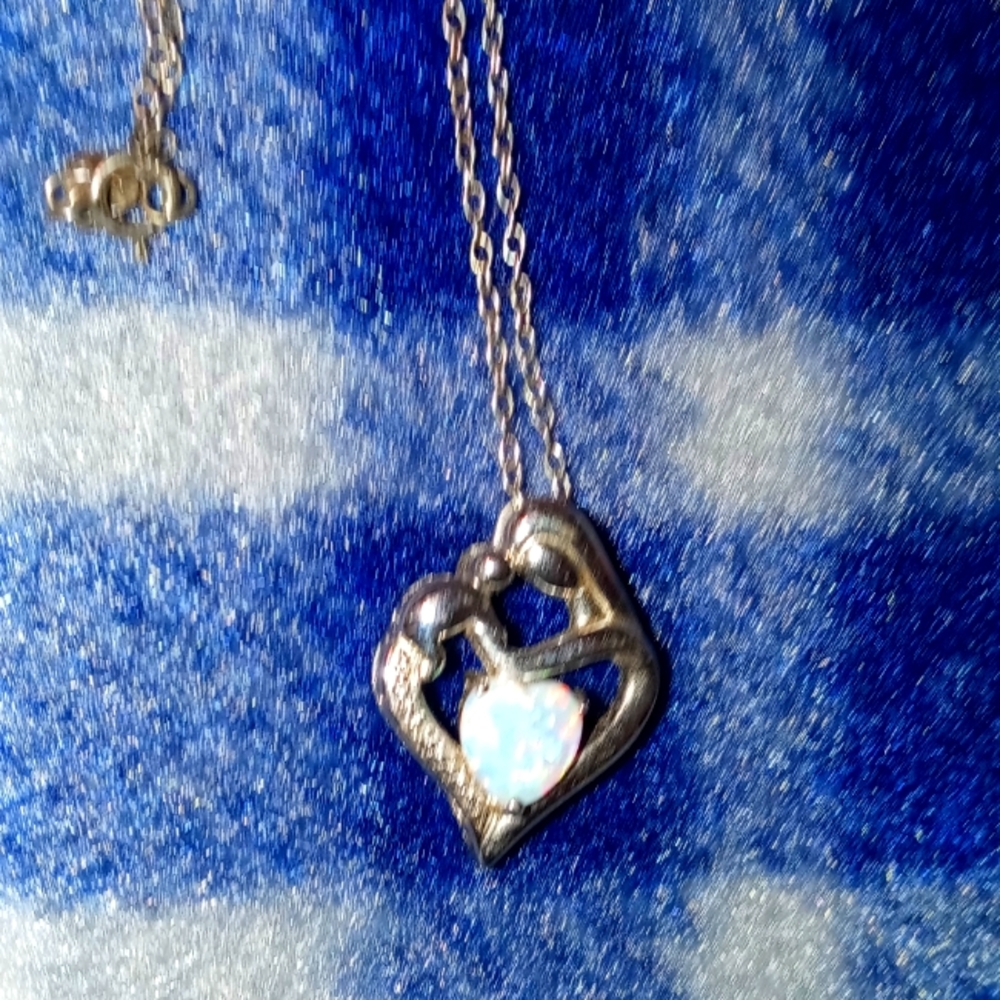 Opal with small diamonds white gold